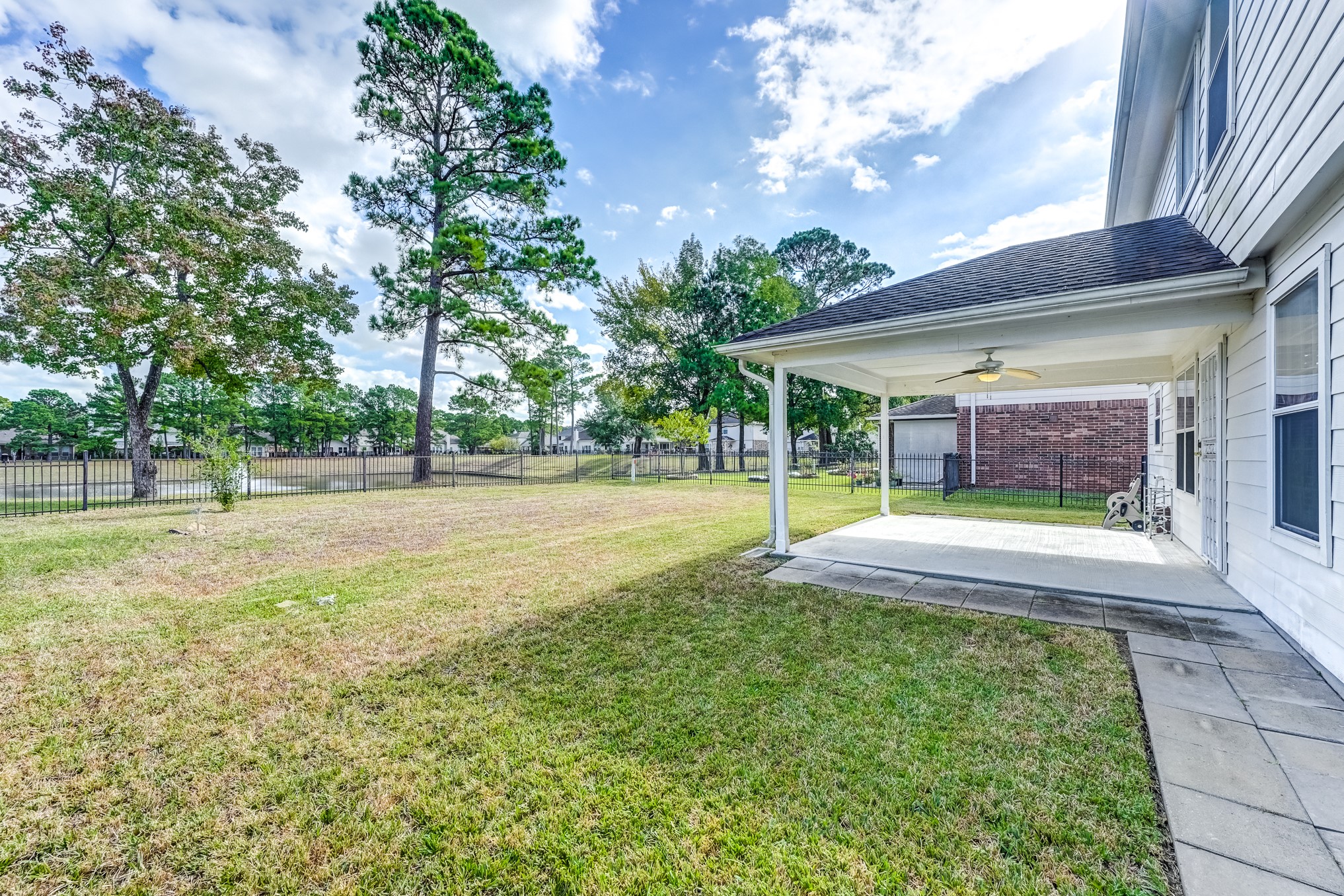14914 Forest Enclave Lane Houston, TX 77068 - Photo 42 of 49 a view of outdoor space yard and swimming pool