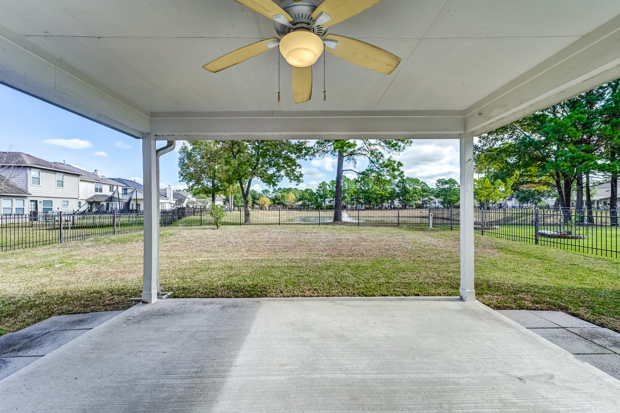 14914 Forest Enclave Lane Houston, TX 77068 - Photo 44 of 49 a view of a yard with a porch
