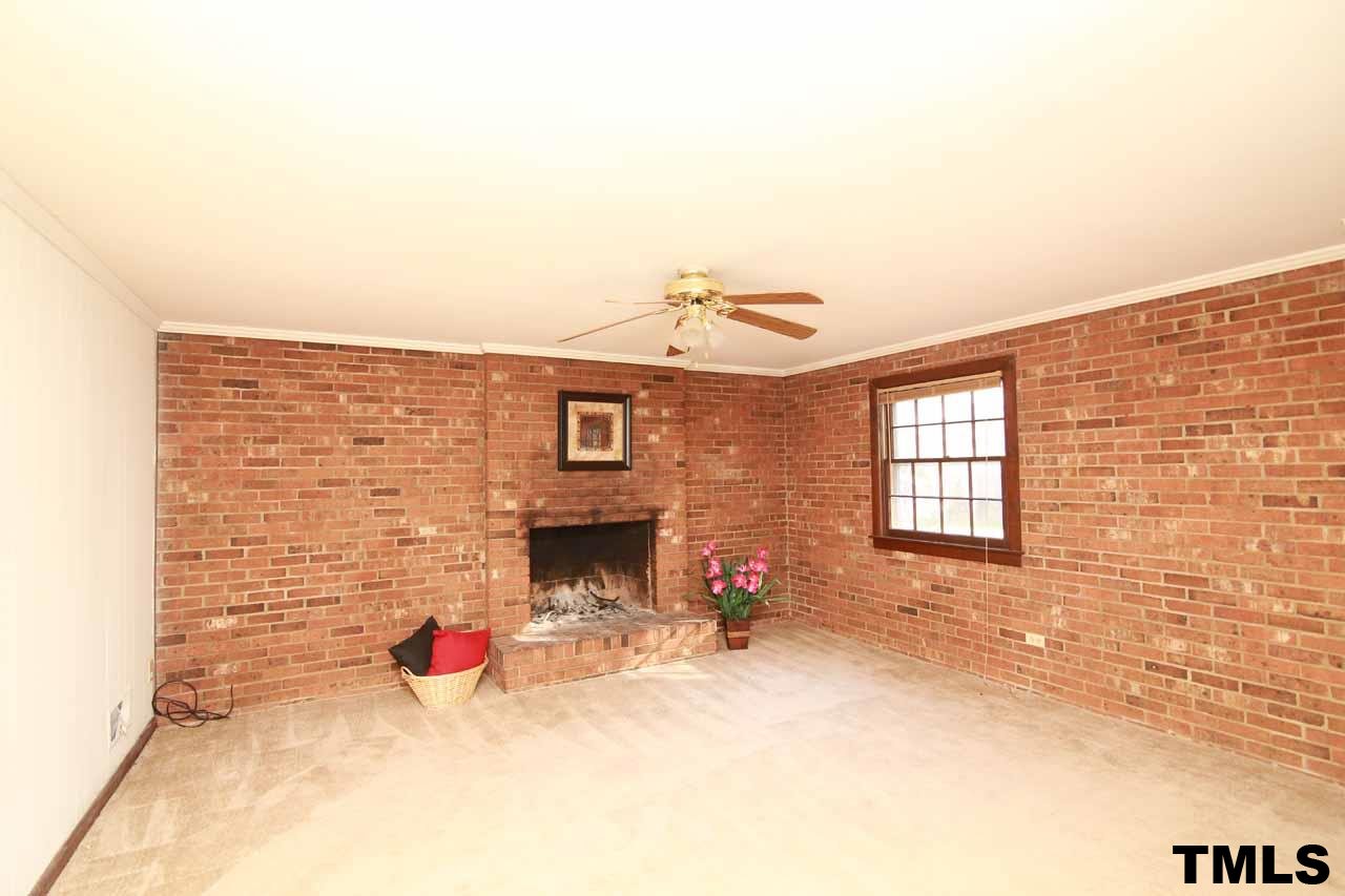 411 East Rowan Street Raleigh, NC 27609 - Photo 13 of 25 a view of a livingroom with a fireplace