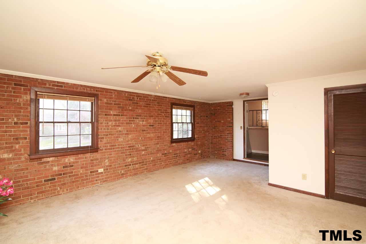 411 East Rowan Street Raleigh, NC 27609 - Photo 15 of 25 an empty room with windows