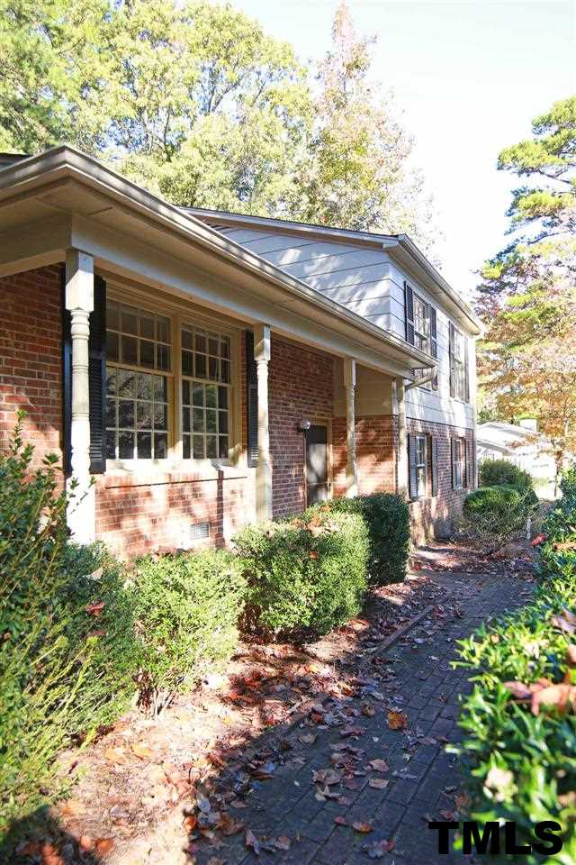 411 East Rowan Street Raleigh, NC 27609 - Photo 22 of 25 a view of a house with a garden