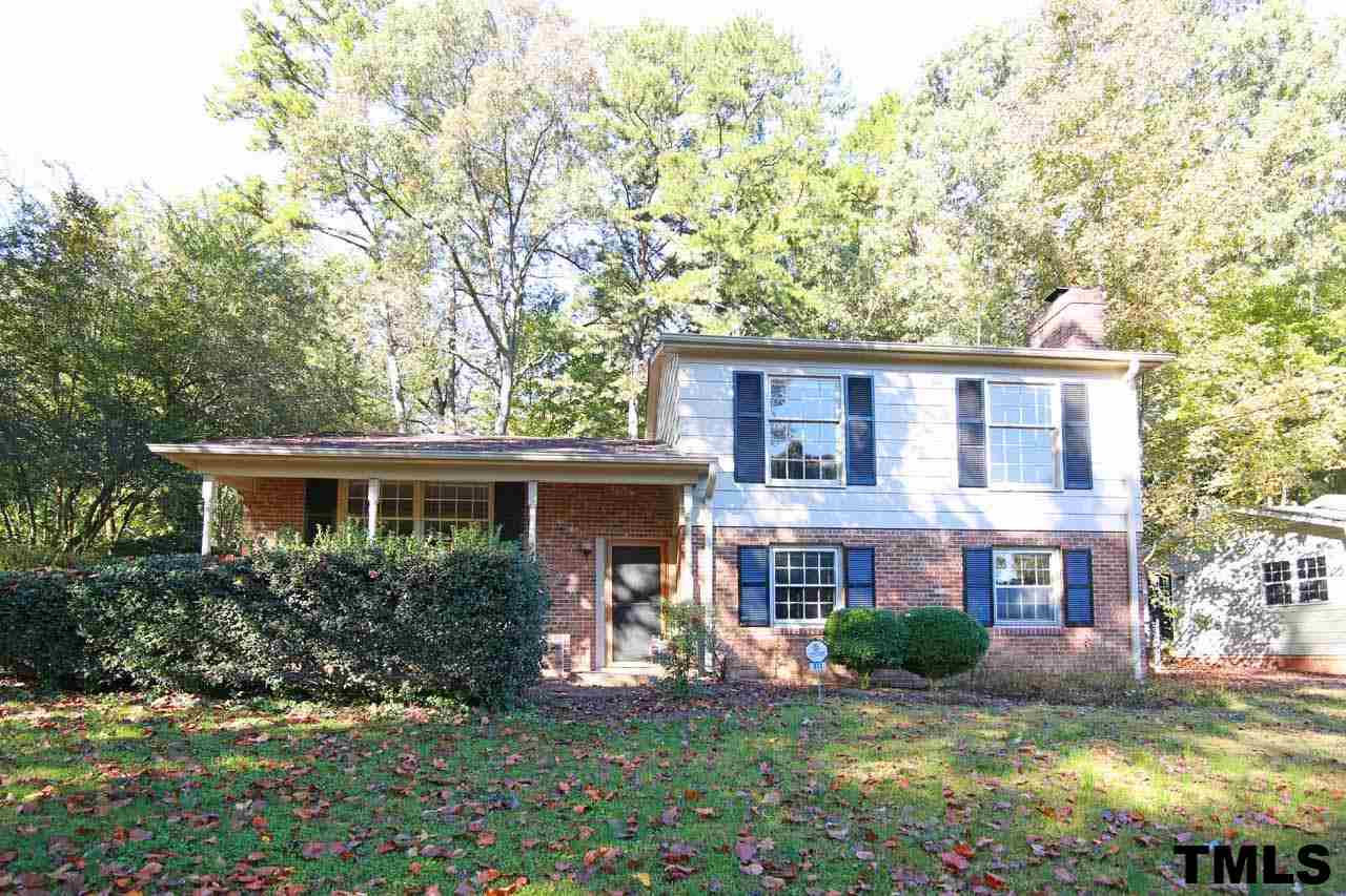 411 East Rowan Street Raleigh, NC 27609 - Photo 23 of 25 front view of a house with a yard