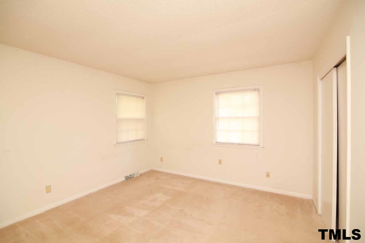 411 East Rowan Street Raleigh, NC 27609 - Photo 25 of 25 an empty room with a window