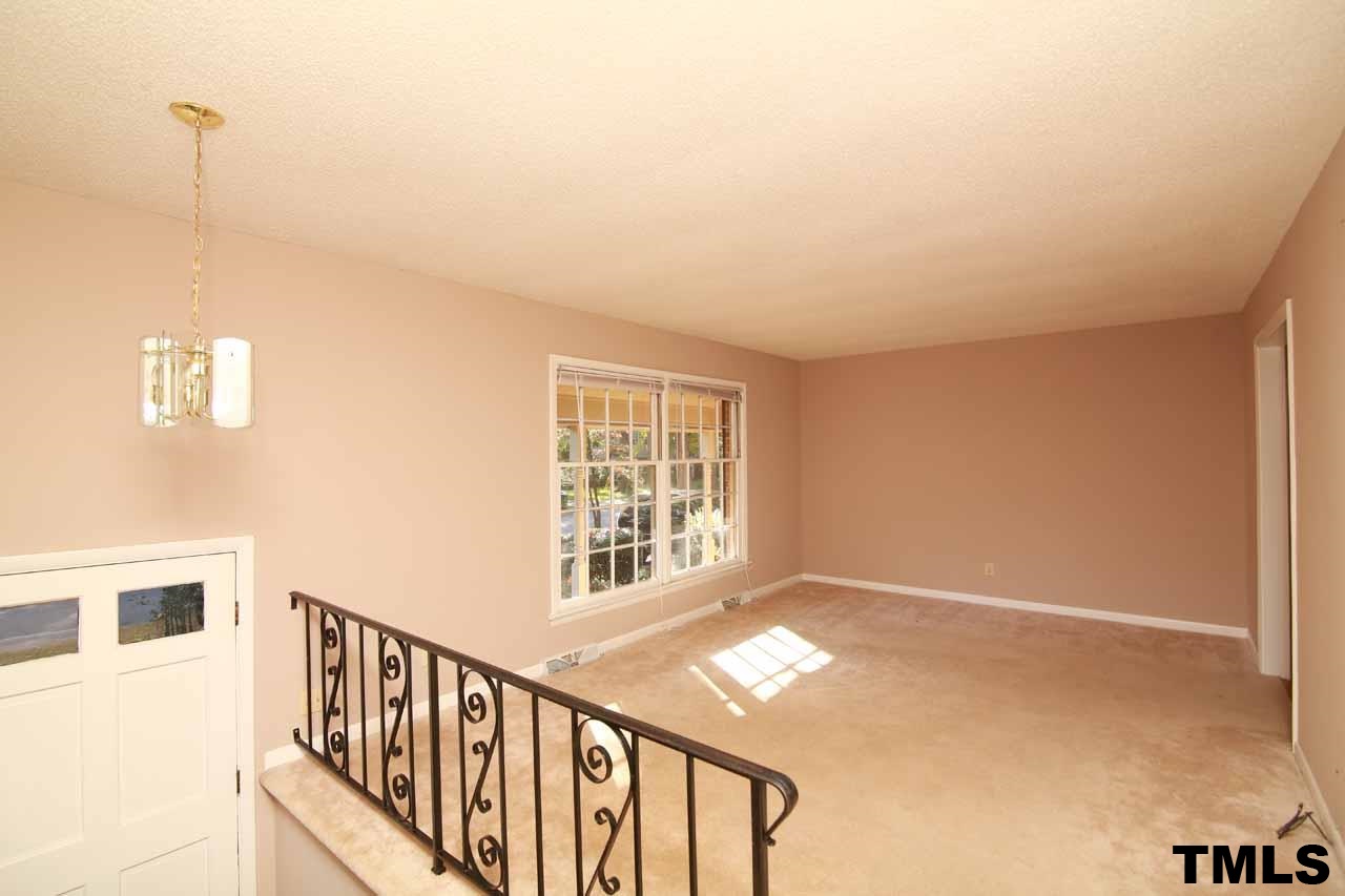 411 East Rowan Street Raleigh, NC 27609 - Photo 6 of 25 a view of an empty room with a window