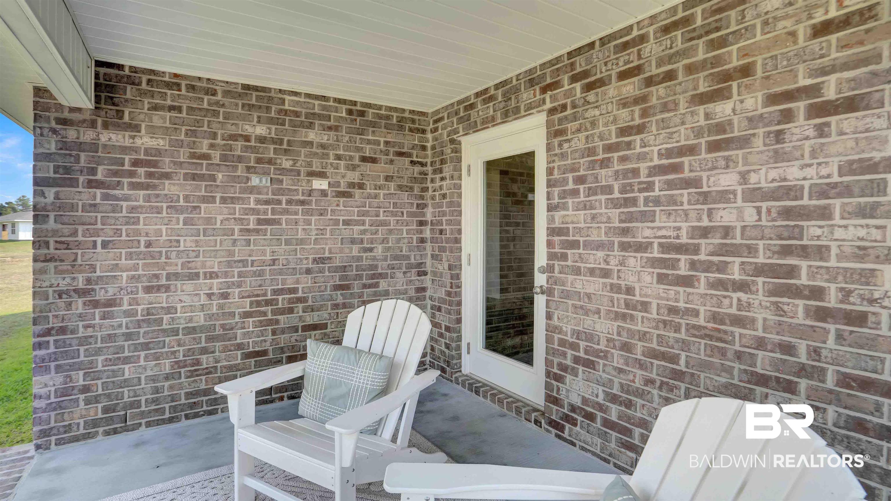 16388 Laurelbrooke Loop, Unit 39 CALI Fairhope, AL 36532 - Photo 27 of 30 View of patio / terrace