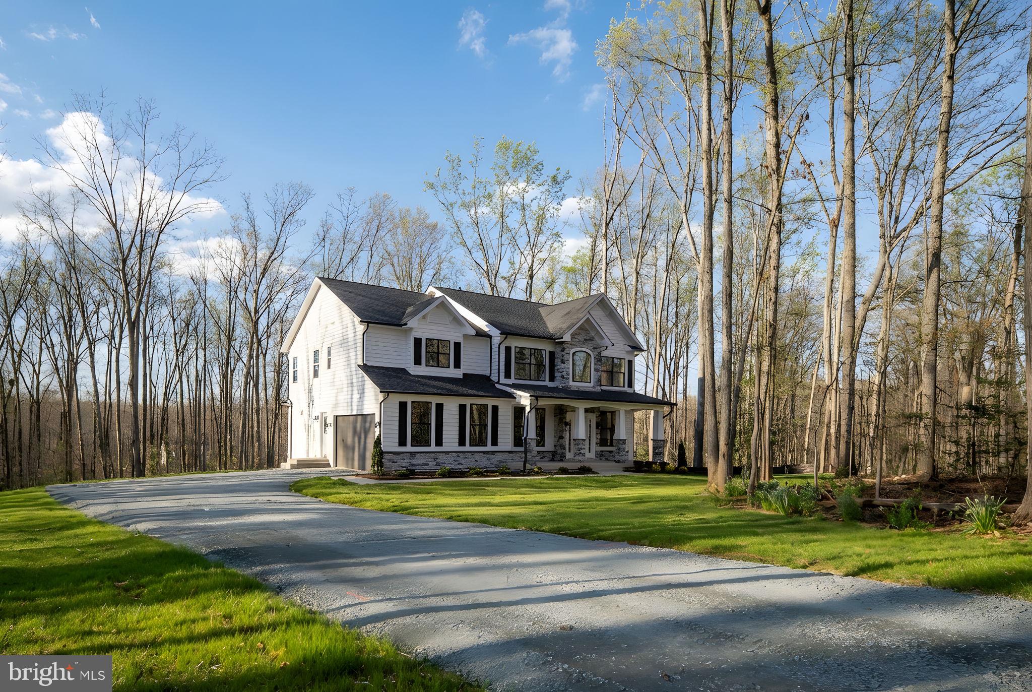 569 Tacketts Mill Road Stafford, VA 22556 - Photo 13 of 120 a view of a house with a big yard and large trees