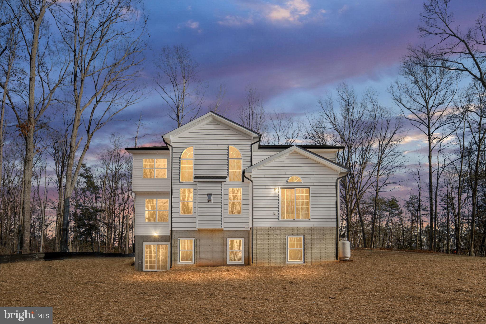 569 Tacketts Mill Road Stafford, VA 22556 - Photo 3 of 120 a front view of a house with a yard