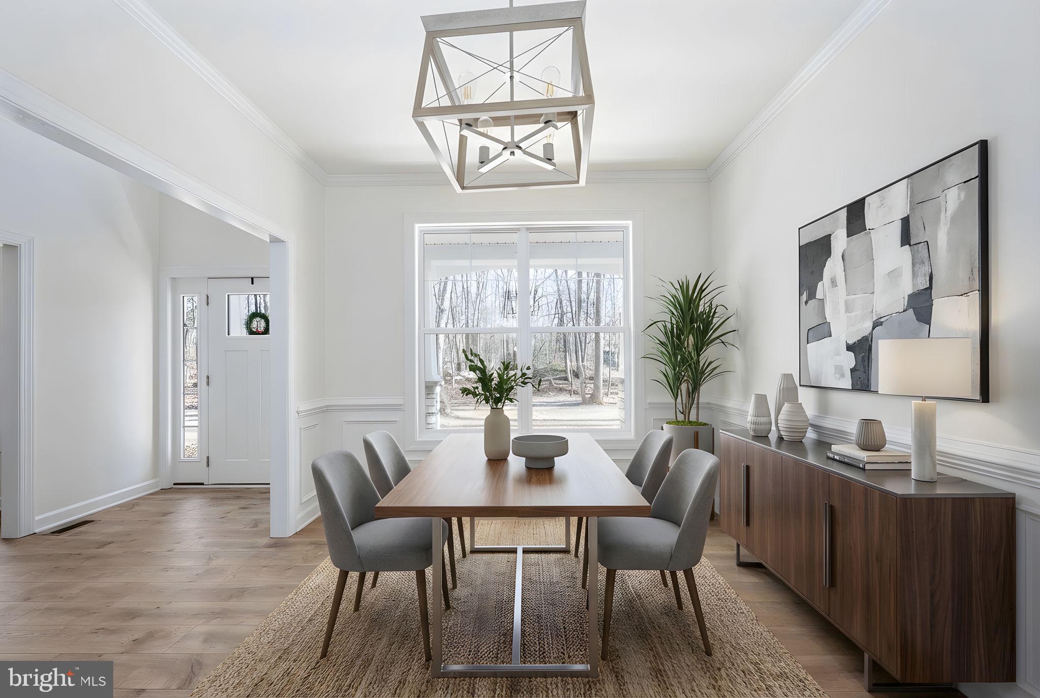 569 Tacketts Mill Road Stafford, VA 22556 - Photo 34 of 120 a view of a dining room with furniture window and wooden floor