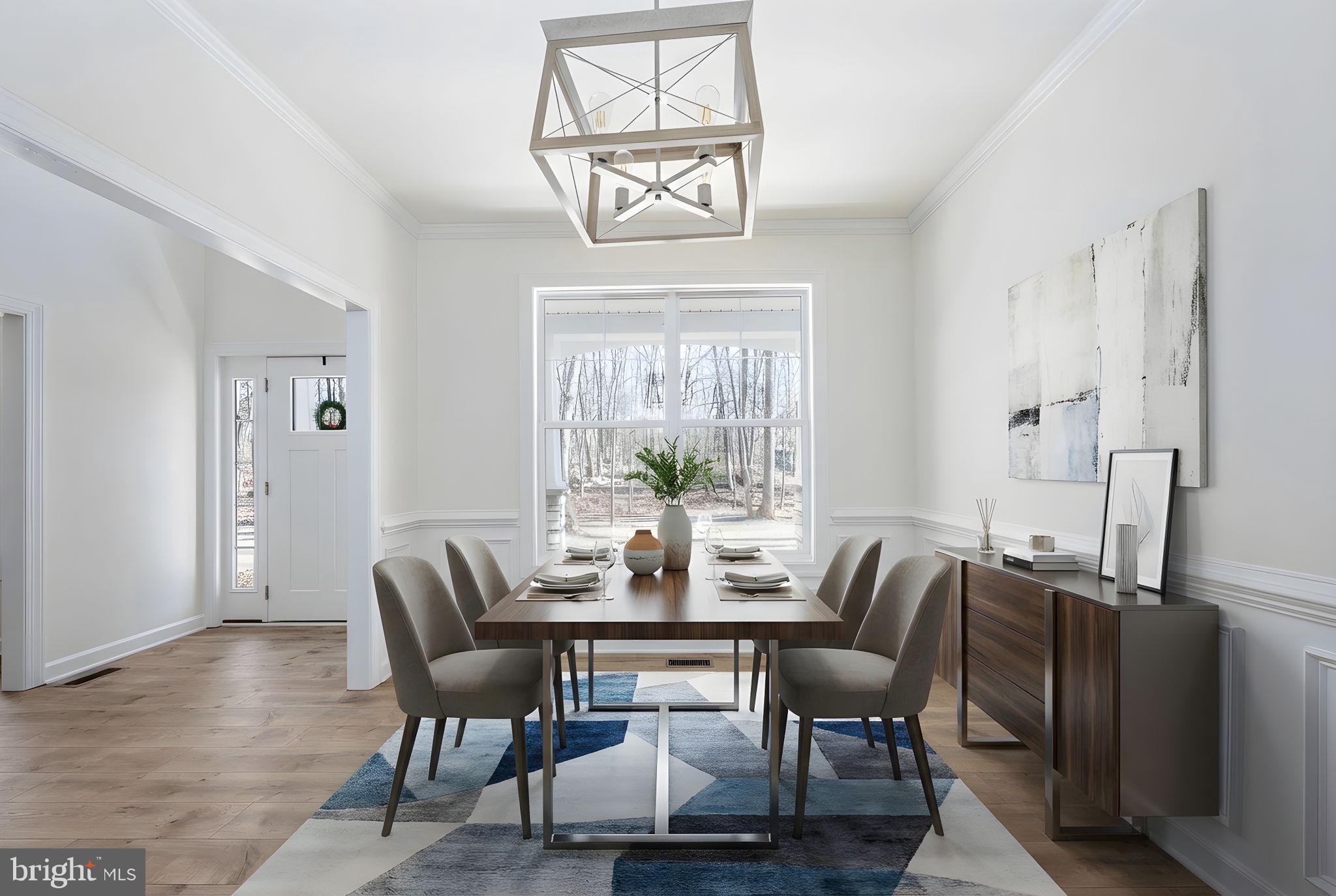 569 Tacketts Mill Road Stafford, VA 22556 - Photo 35 of 120 a view of a dining room with furniture window and wooden floor