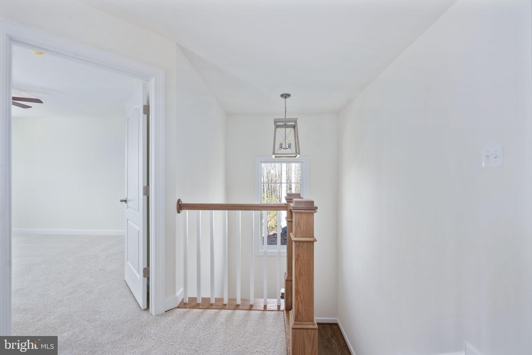 569 Tacketts Mill Road Stafford, VA 22556 - Photo 99 of 120 a view of a livingroom with wooden floor
