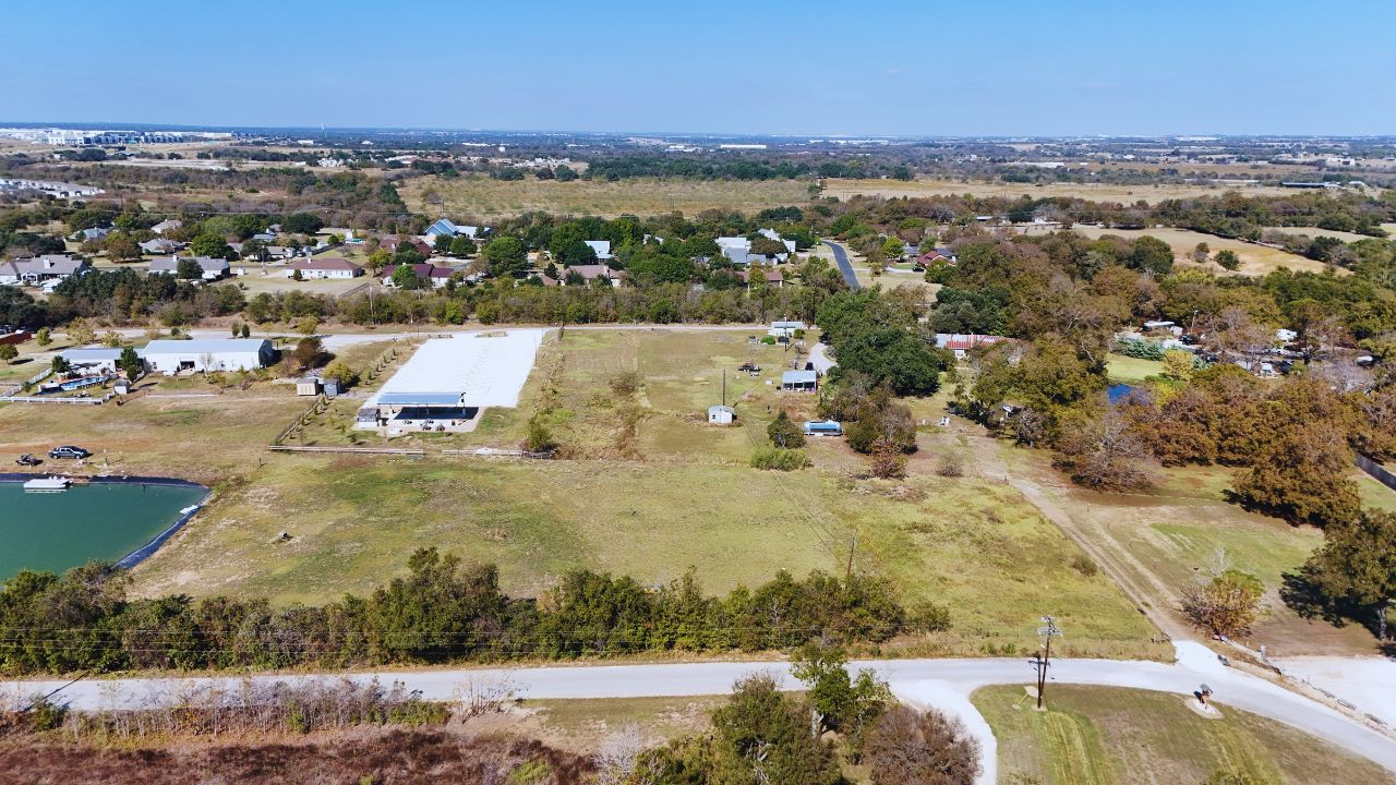 Undisclosed Address Georgetown, TX 78626 - Photo 2 of 4 an aerial view of residential houses with outdoor space