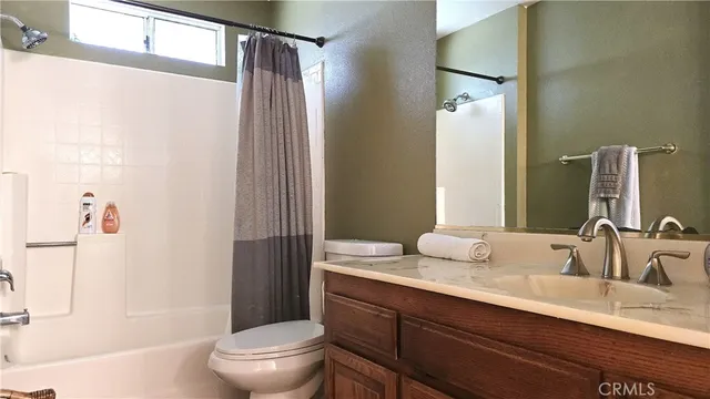 a view of entryway and hall with dining room