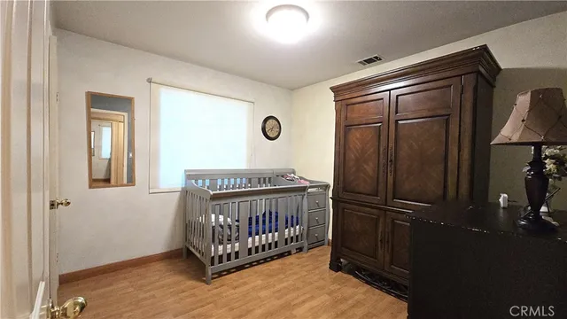 a view of a bathroom with a sink and a mirror