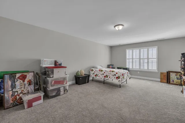 a view of a livingroom with furniture
