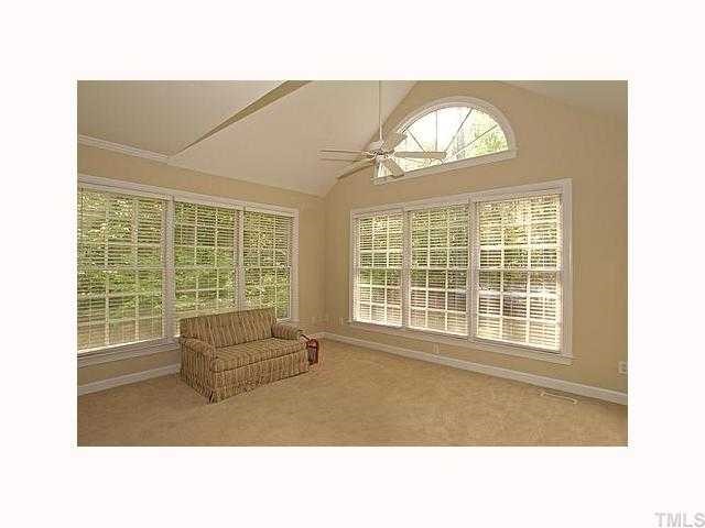2508 Sunnystone Way Raleigh, NC 27613 - Photo 7 of 12 Enjoy the sun room that has access to the deck.