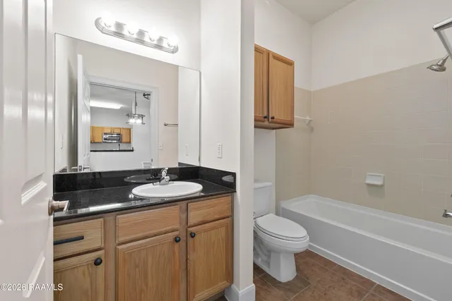 $235,000 | 201 Settlers Trace Boulevard, Unit 1405, Lafayette, LA 70508