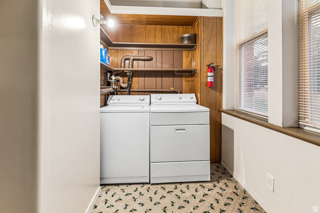 21 North Main Street Kingston, UT 84743 - Photo 74 of 107 Laundry area featuring independent washer and dryer and wood walls