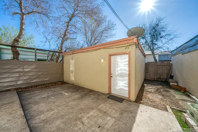 a view of a house with a large window