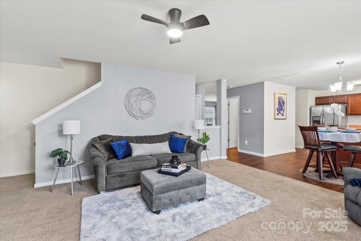 1848 Greenbrook Trail Dallas, NC 28034 - Photo 15 of 33 a living room with furniture and a clock