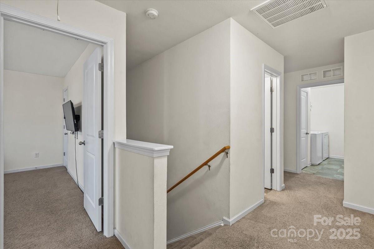 1848 Greenbrook Trail Dallas, NC 28034 - Photo 17 of 33 a view of a hallway with rooms