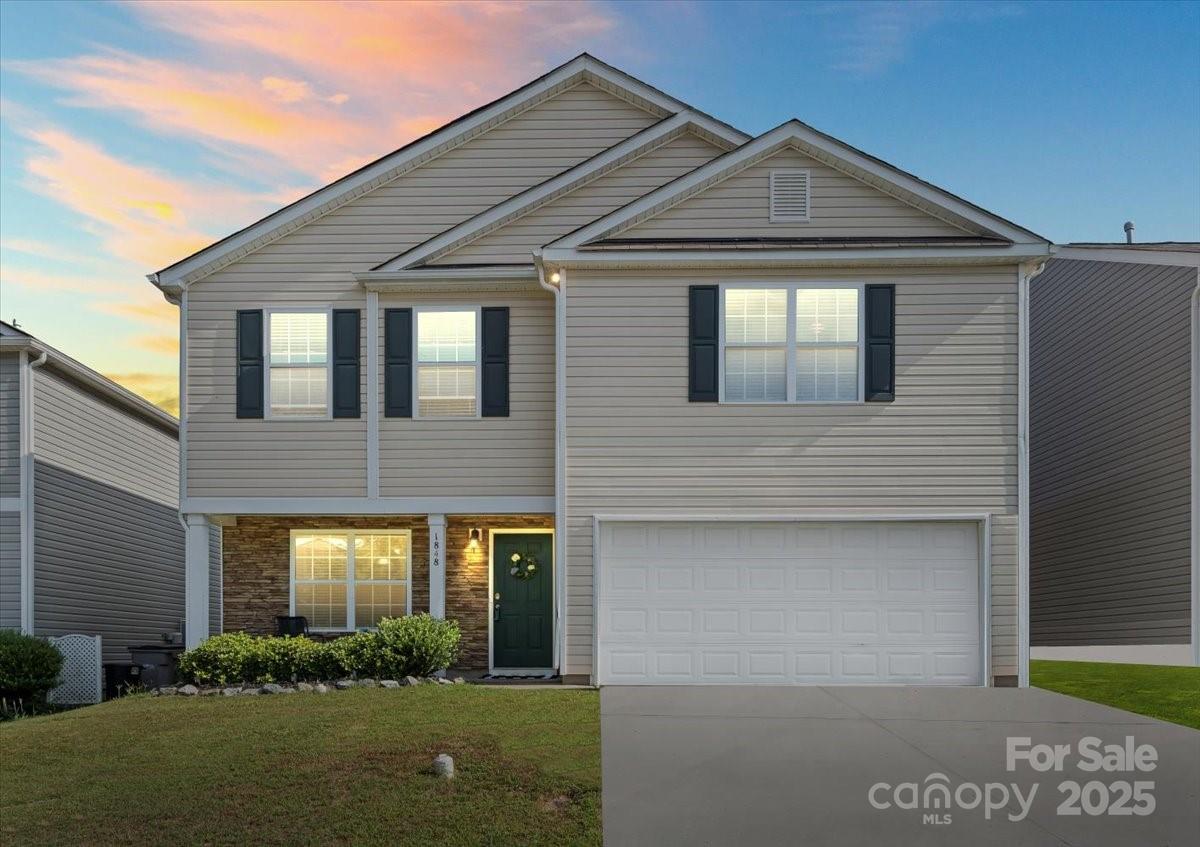 1848 Greenbrook Trail Dallas, NC 28034 - Photo 2 of 33 a front view of a house with garden