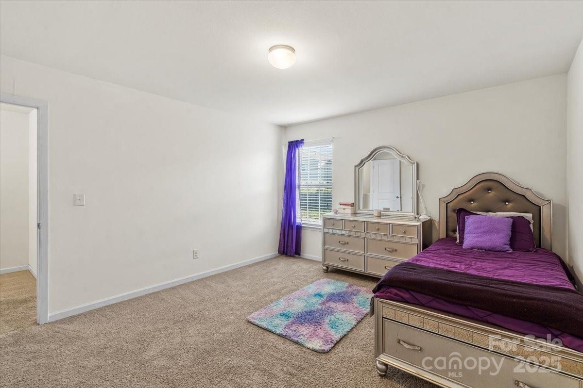 1848 Greenbrook Trail Dallas, NC 28034 - Photo 25 of 33 a living room with furniture and flat screen tv