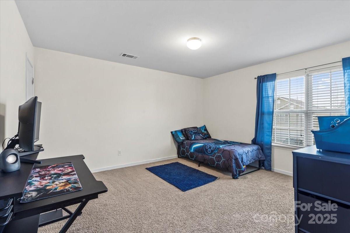 1848 Greenbrook Trail Dallas, NC 28034 - Photo 29 of 33 a living room with furniture and a window