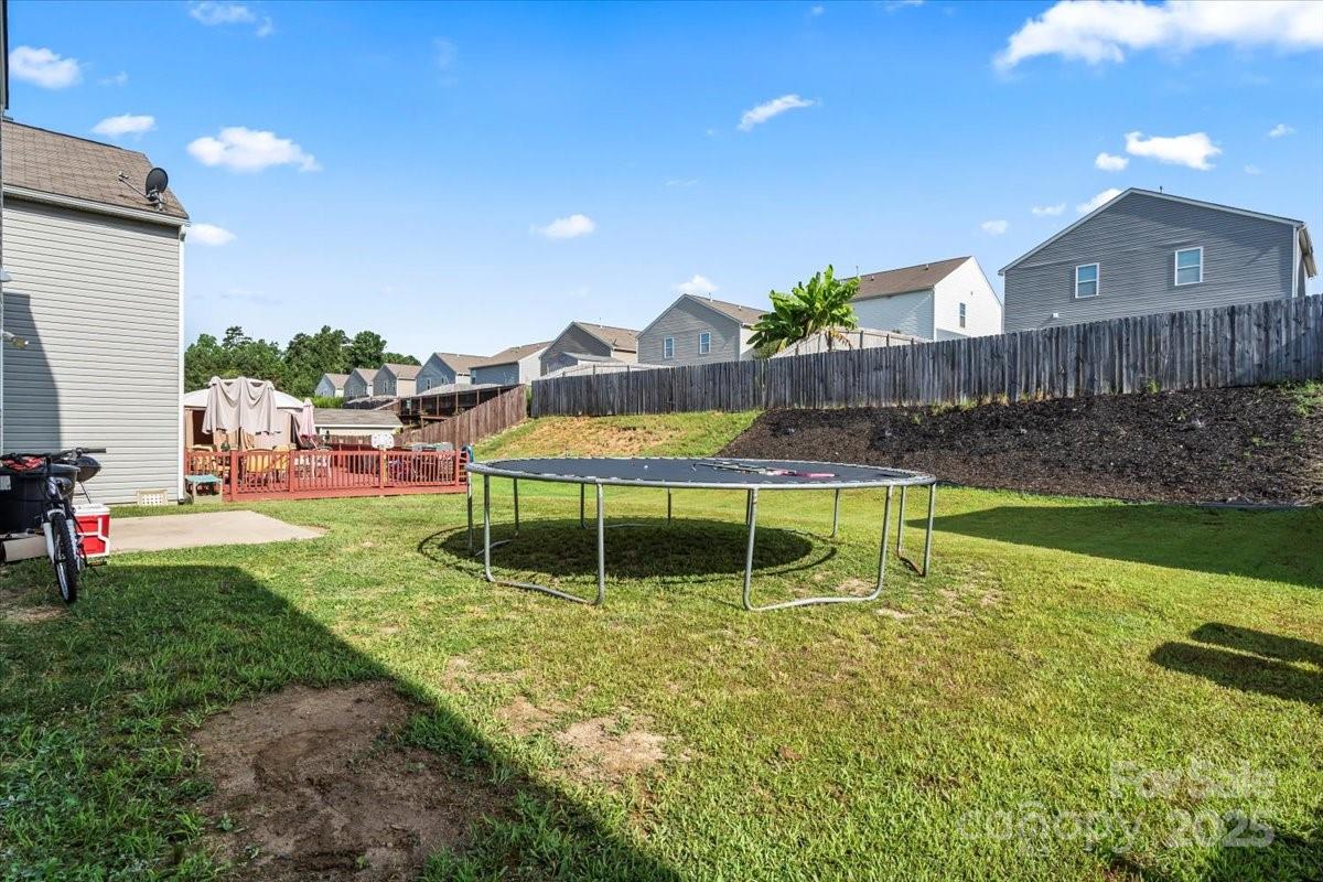 1848 Greenbrook Trail Dallas, NC 28034 - Photo 32 of 33 a swimming pool with outdoor seating and yard