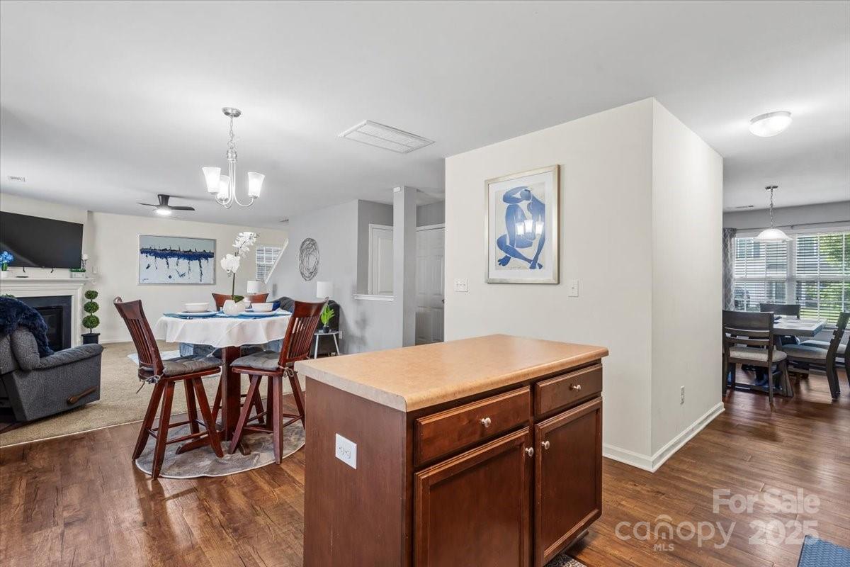 1848 Greenbrook Trail Dallas, NC 28034 - Photo 9 of 33 a view of a dining room with furniture window and wooden floor