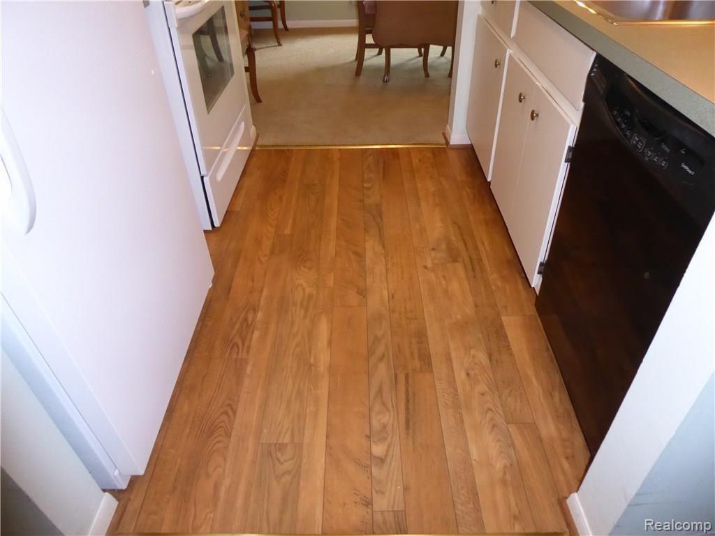 1199 South Sheldon Road, Unit L86 Plymouth, MI 48170 - Photo 16 of 38 Wood-look Flooring