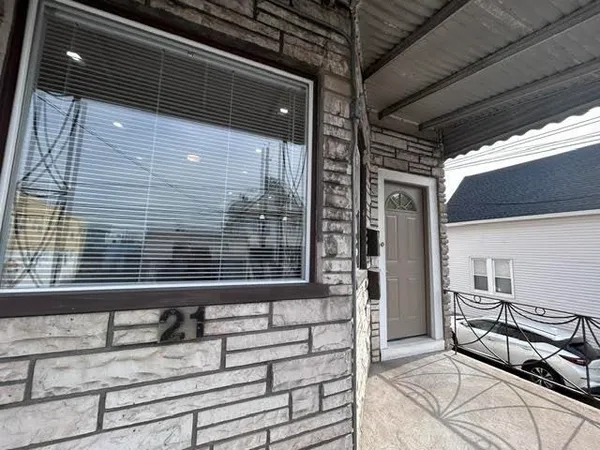 a view of house with a window and wooden floor