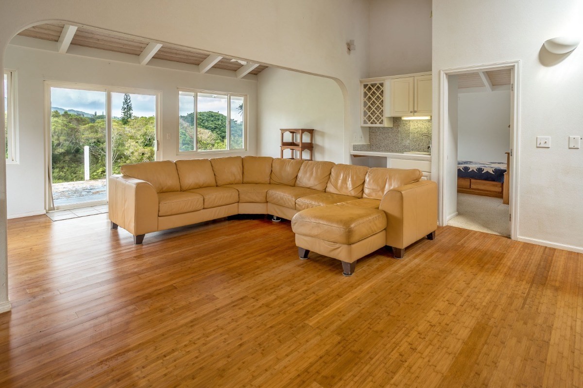 6420 Kalama Road, Unit 1 Kapaa, HI 96746 - Photo 5 of 22 a living room with furniture and a large window