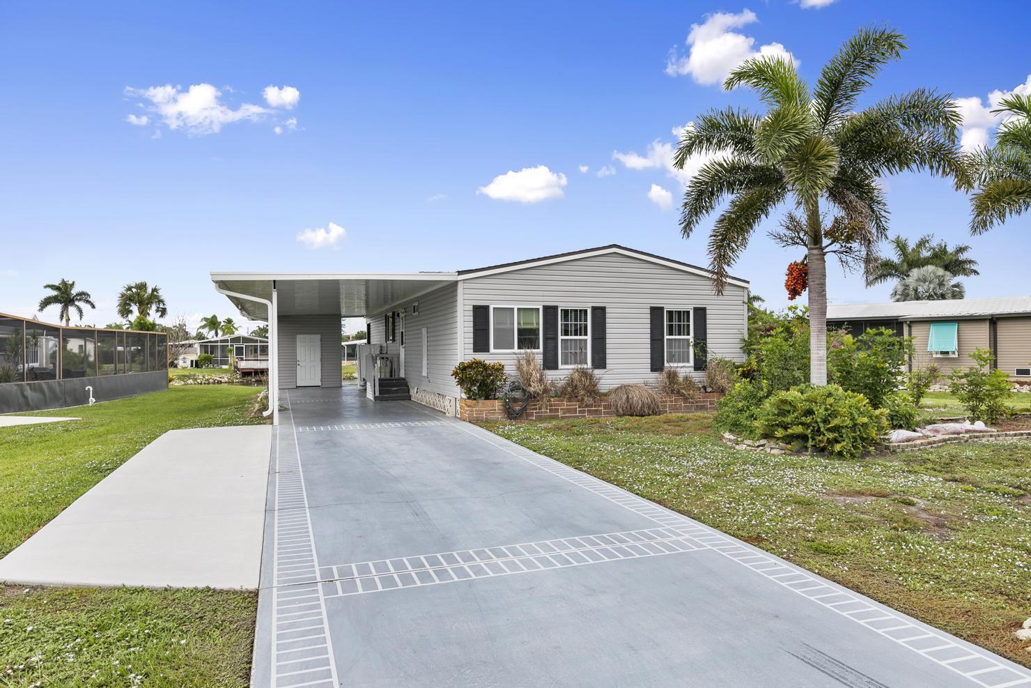 117 Audubon Road Naples, FL 34114 - Photo 2 of 30 1F3A6186