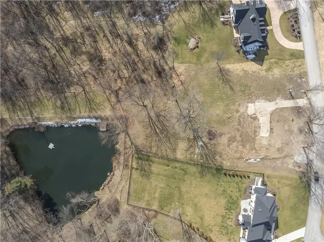 an aerial view of a city with lots of residential buildings
