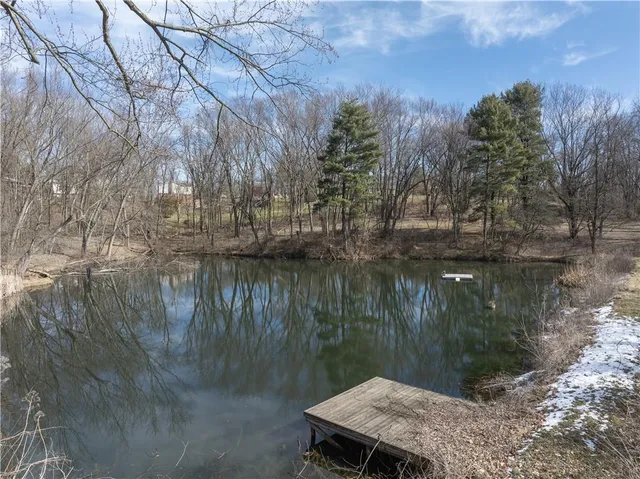 a lake view with a yard