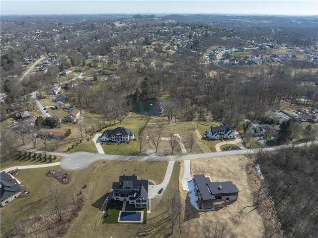 an aerial view of a city with lots of residential buildings
