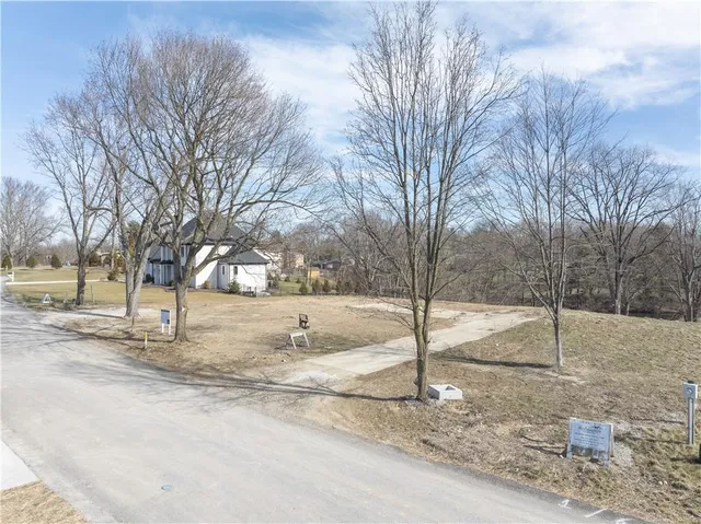 a view of a backyard of the house