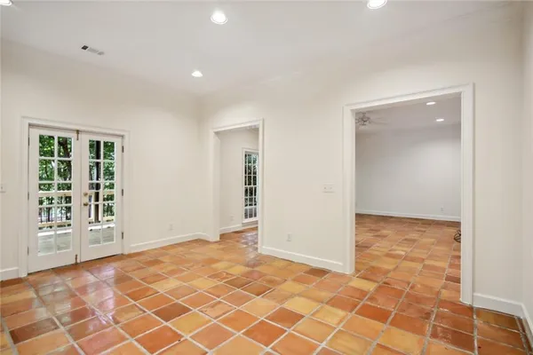 an empty room with windows