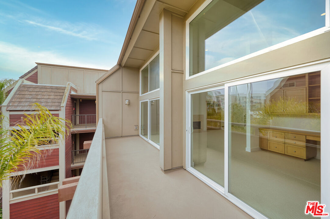 4250 Vía Dolce, Unit 321 Marina del Rey, CA 90292 - Photo 14 of 42 a view of front door of house and an outdoor space