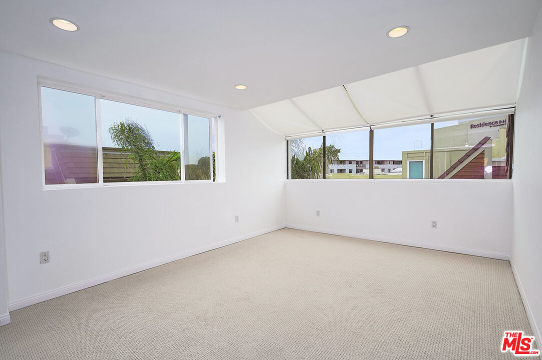 4250 Vía Dolce, Unit 321 Marina del Rey, CA 90292 - Photo 17 of 42 a view of an empty room with a window