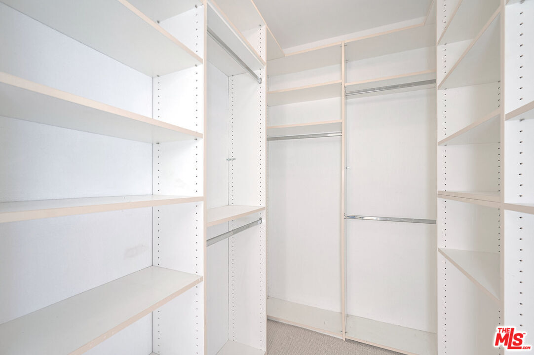 4250 Vía Dolce, Unit 321 Marina del Rey, CA 90292 - Photo 19 of 42 a view of walk in closet with empty racks