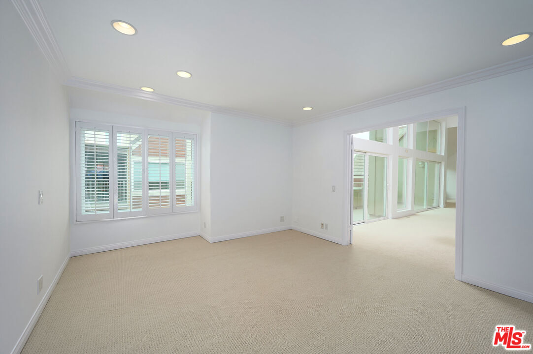 4250 Vía Dolce, Unit 321 Marina del Rey, CA 90292 - Photo 21 of 42 an empty room with windows