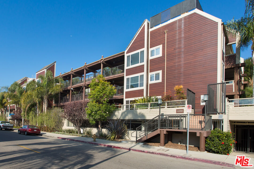4250 Vía Dolce, Unit 321 Marina del Rey, CA 90292 - Photo 39 of 42 a front view of a building with street view