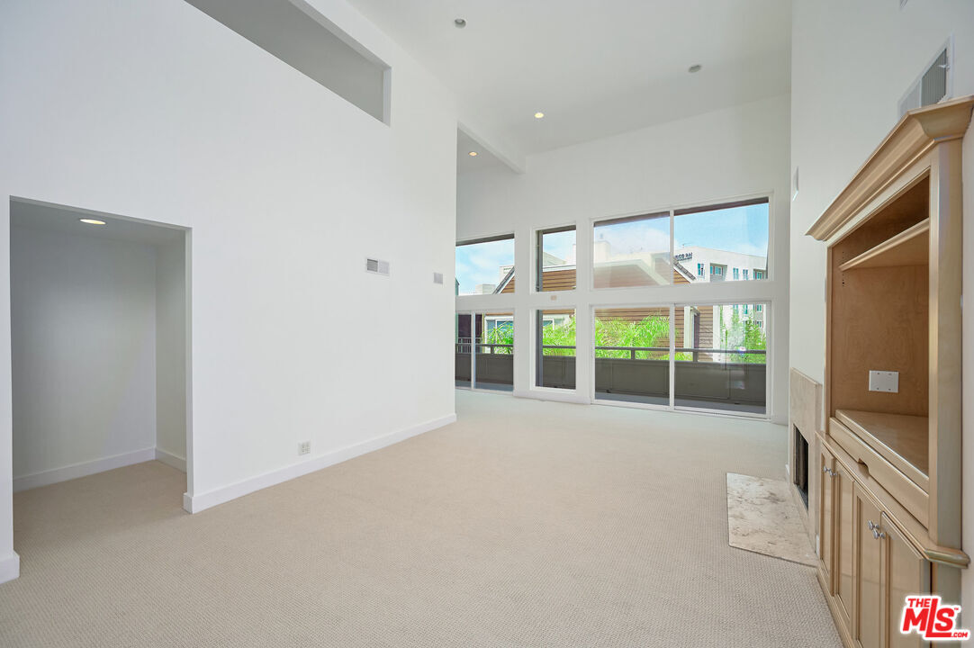 4250 Vía Dolce, Unit 321 Marina del Rey, CA 90292 - Photo 5 of 42 a view of an empty room with windows