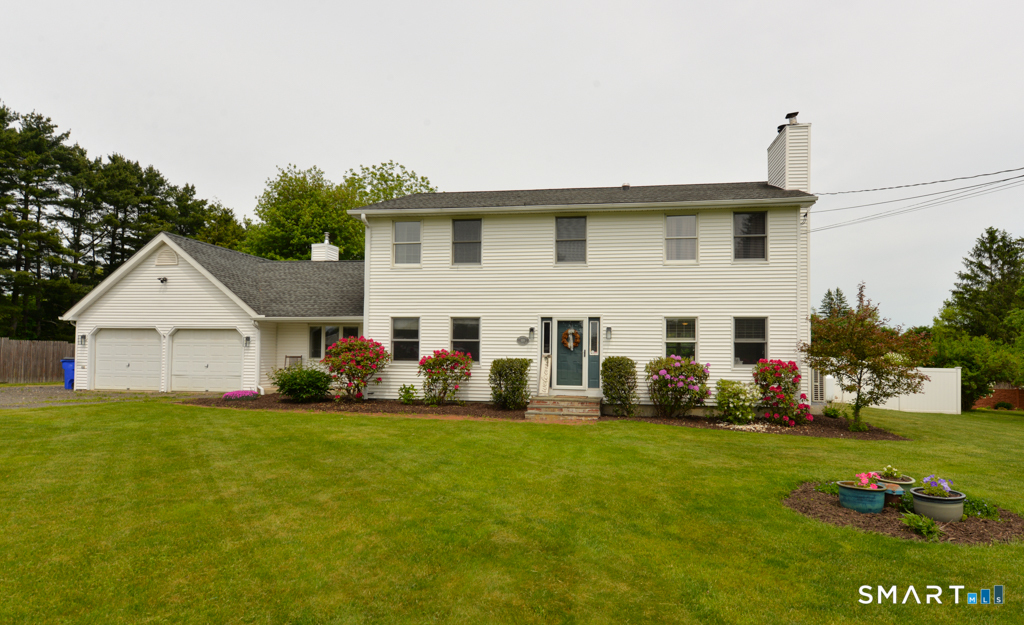109 Harrison Lane Bethlehem, CT 06751 - Photo 25 of 28 a front view of a house with a yard