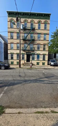 a view of building with a street