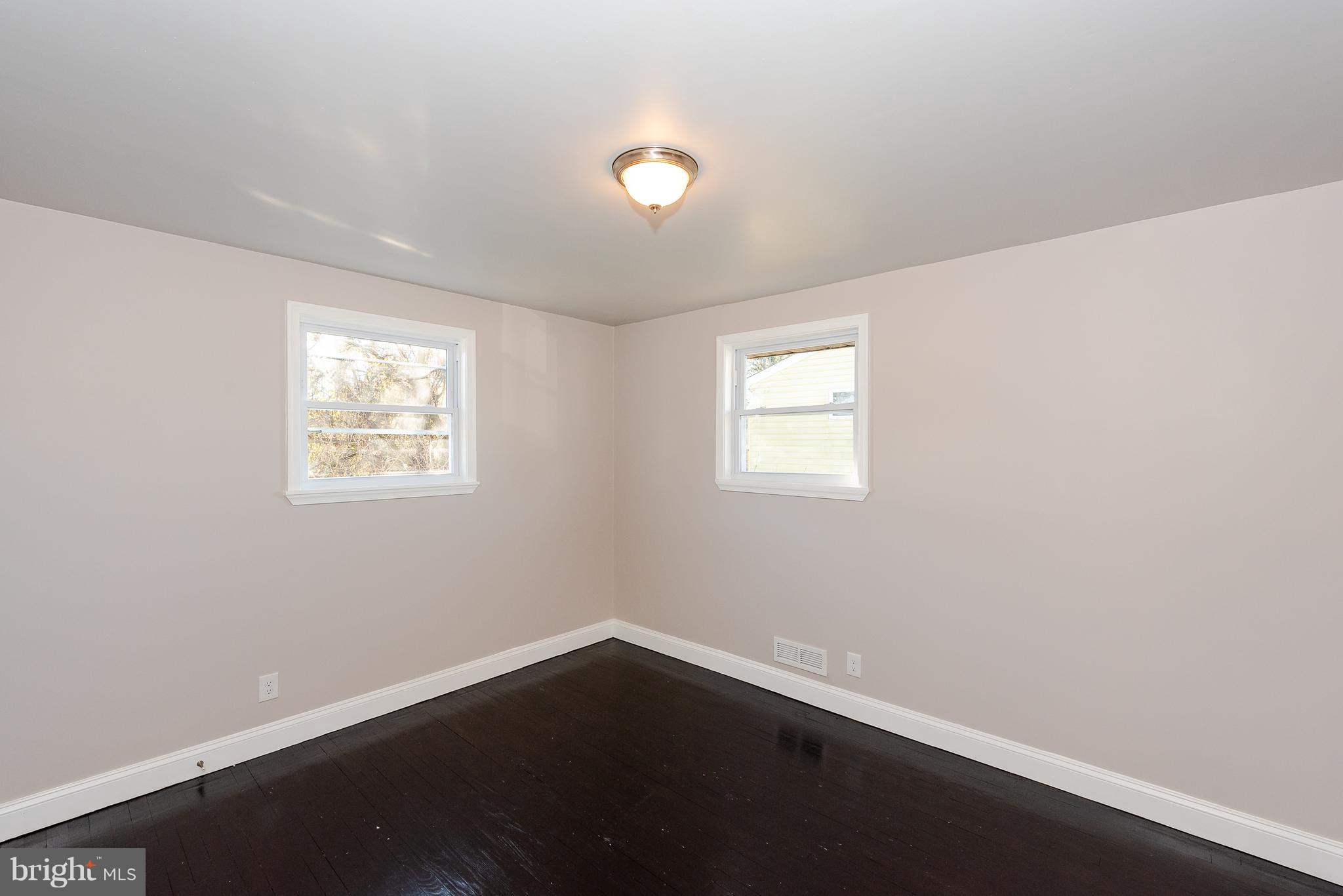 3327 Essex Road Baltimore, MD 21207 - Photo 20 of 35 an empty room with a window