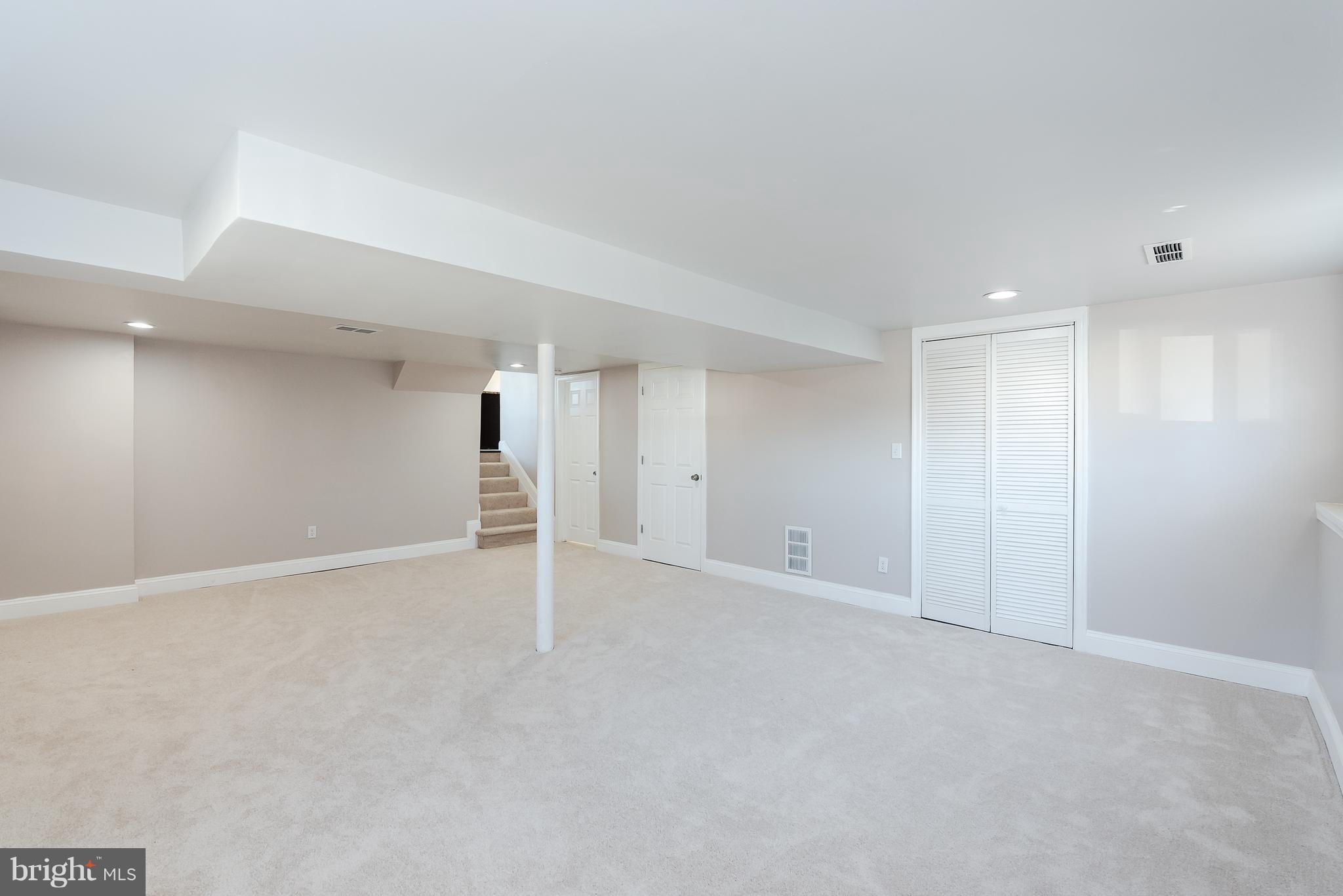 3327 Essex Road Baltimore, MD 21207 - Photo 27 of 35 a view of an empty room with wooden floor