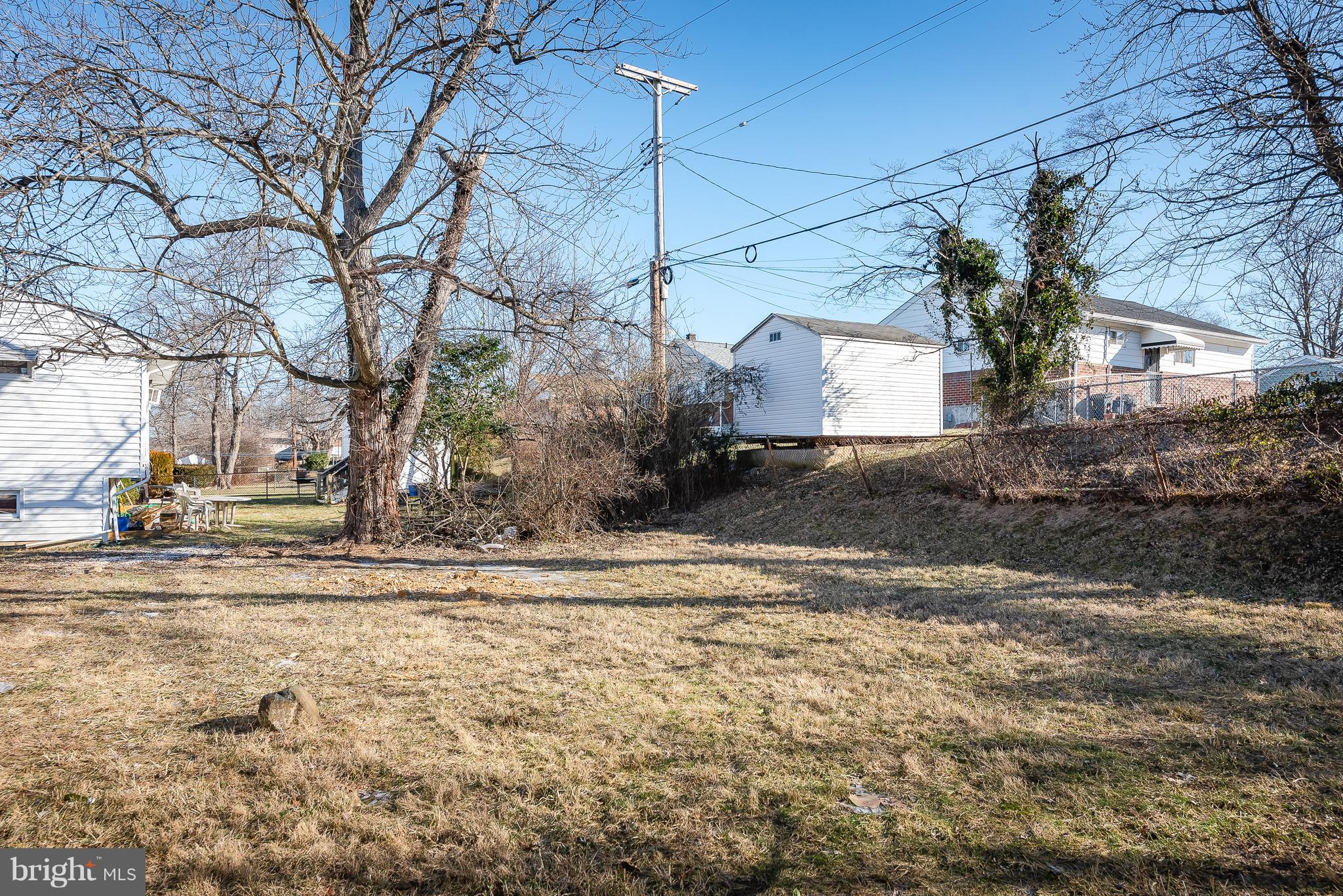 3327 Essex Road Baltimore, MD 21207 - Photo 32 of 35 a view of a house with a yard