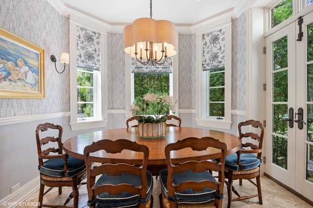145 Oxford Road Kenilworth, IL 60043 - Photo 30 of 66 a dining room with furniture and window